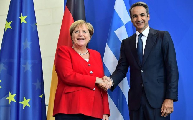 Мицотакис и Меркель обсудили миграционный кризис